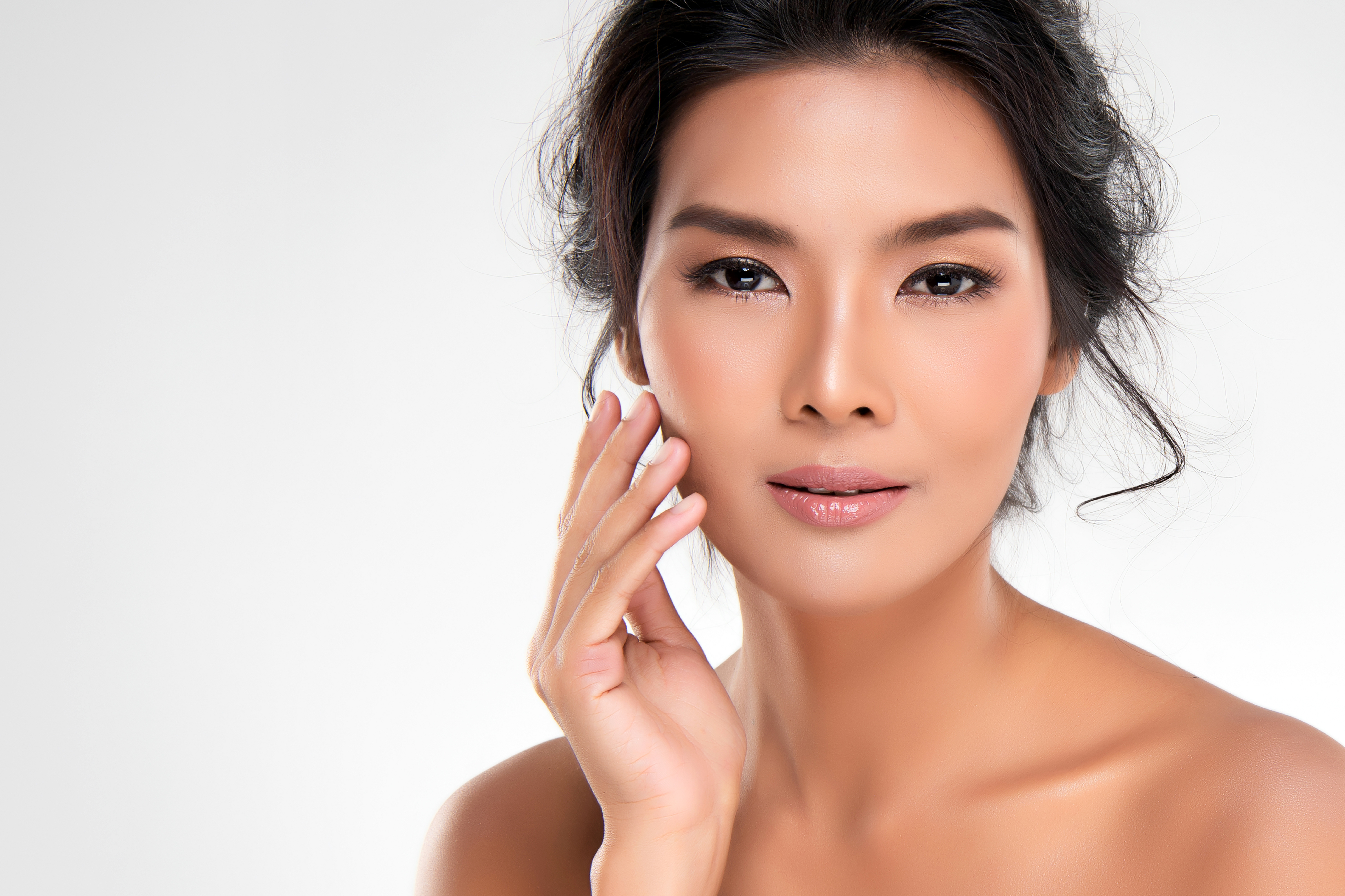 Beautiful Young Asian Woman with Clean Fresh Skin